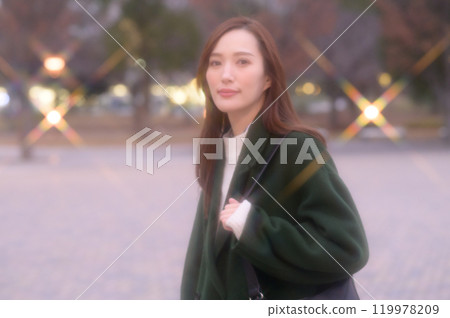 A woman enjoying winter illuminations A woman enjoying winter illuminations 119978209