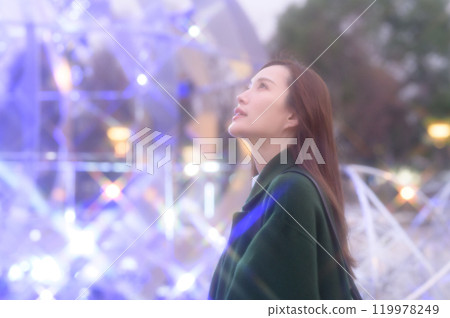 A woman enjoying winter illuminations 119978249