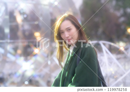 A woman enjoying winter illuminations 119978258