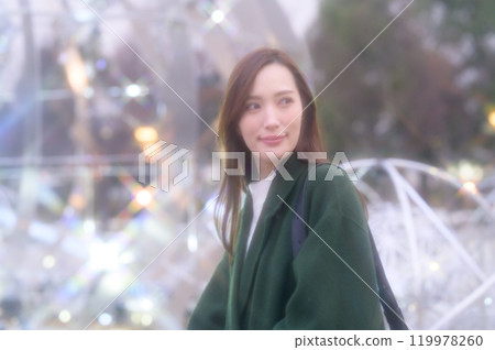 A woman enjoying winter illuminations 119978260