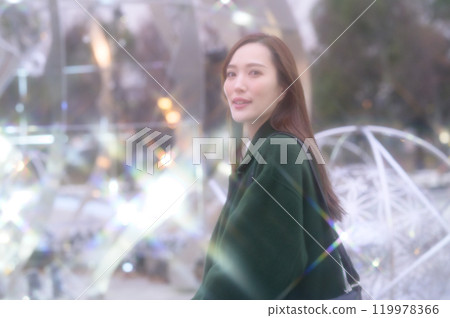 A woman enjoying winter illuminations 119978366