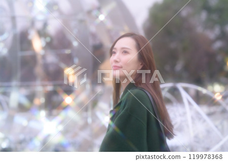 A woman enjoying winter illuminations 119978368