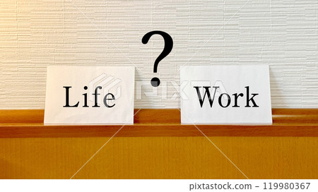Two illuminated white cards with the words "Life" and "Work" and a question mark Two illuminated white cards with the words "Life" and "Work" and a question mark 119980367