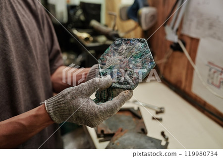 New reclaimed tile in engineer hands New reclaimed tile in engineer hands 119980734