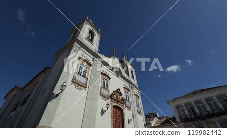 Colonial church in Brazil with a tour group and guide Colonial church in Brazil with a tour group and guide 119982442