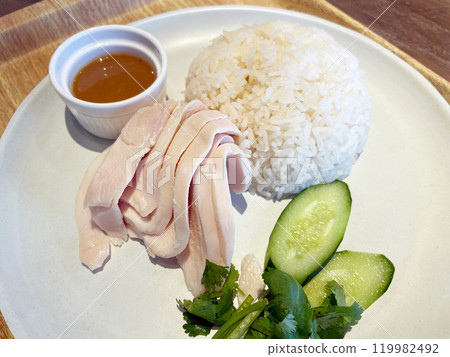 Khao Man Gai (Hainanese Chicken Rice): A classic Thai chicken rice dish. 119982492