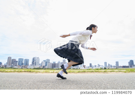A high school girl running A high school girl running 119984070