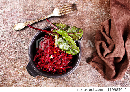 Beetroot salad with wallnuts and garlic in bowl Beetroot salad with wallnuts and garlic in bowl 119985641