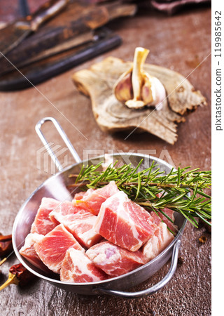 raw meat with spice in pan raw meat with spice in pan 119985642