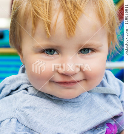 cute little baby face close up 119986911