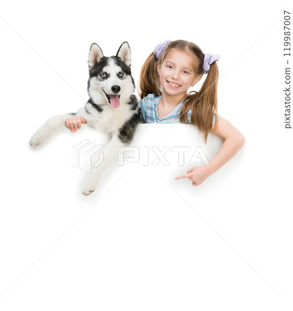 happy little girl and dog Husky with white cardboard 119987007