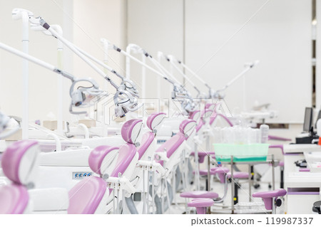 Many modern dental equipment and seats in a hygiene and sterile dental training room in the hospital. 119987337