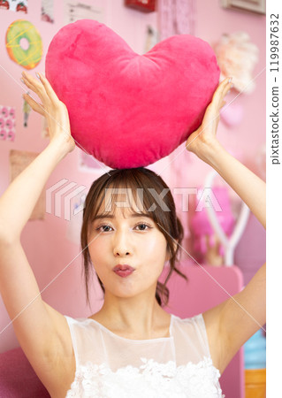 Young woman in wedding dress (Fancy photo props room) Young woman in wedding dress (Fancy photo props room) 119987632