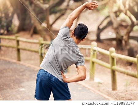 Stretching, back and man in road, outdoor and fitness for athlete in nature, wellness and exercise. Park, healthy and person with performance, warm up and flexible in weekend, sport and active 119988177
