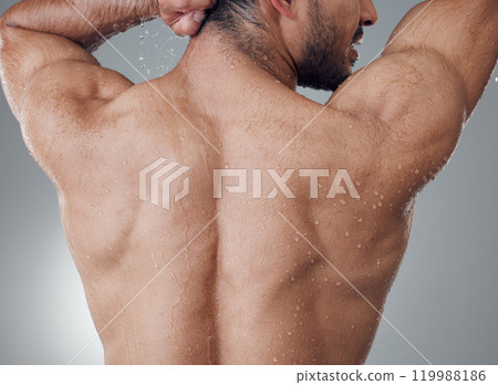 Man, shower and washing back in studio for cleaning, water and skin for grooming on gray background. Male person, cosmetics and liquid for treatment in morning routine, health and hygiene or beauty 119988186