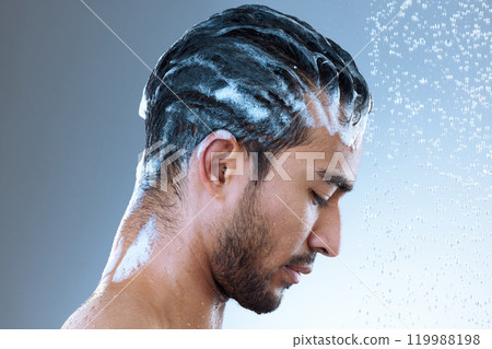 Studio, man and hair with shampoo, cleaning and routine of haircare, water drop and cosmetics for wellness. Gray background, grooming and cleaning of scalp, profile and person with soap and morning Studio, man and hair with shampoo, cleaning and routine of haircare, water drop and cosmetics for wellness. Gray background, grooming and cleaning of scalp, profile and person with soap and morning 119988198