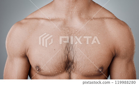 Water, shower and chest of man with muscle for self care maintenance, body cleaning and spa salon wellness. Skincare, nude model or studio person hygiene on grey background, routine or liquid wash 119988280