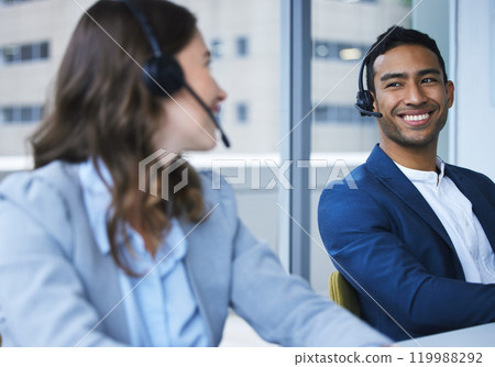 Smile, call centre agent and headphones for coworker in office, happy and online for sales team. Telemarketing, help and support of colleague, CRM and customer service for man and female person 119988292