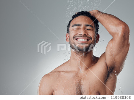 Man, shower and washing hair in studio for cosmetics, water and cleaning or grooming on gray background. Person, mockup space and liquid for treatment in morning routine, health and hygiene or beauty Man, shower and washing hair in studio for cosmetics, water and cleaning or grooming on gray background. Person, mockup space and liquid for treatment in morning routine, health and hygiene or beauty 119988308
