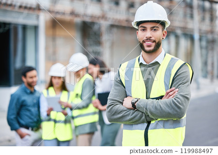 Arms crossed, leadership and portrait of construction worker man on building site for project management. Architecture, city or industry and happy engineer outdoor with team for infrastructure 119988497
