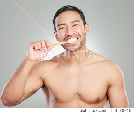Dental, portrait and man with toothbrush in studio for oral hygiene, wellness or teeth whitening on white background. Mouth, body and hand of model for toothpaste, self care or morning routine 119988748