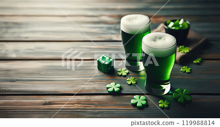 St. Patric's Day Green Beer pint over dark wooden background, decorated with shamrock leaves. Mug of Green beer close-up. 119988814