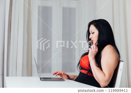 Beautiful Woman Works Studying Online With Laptop Beautiful Woman Works Studying Online With Laptop 119989411
