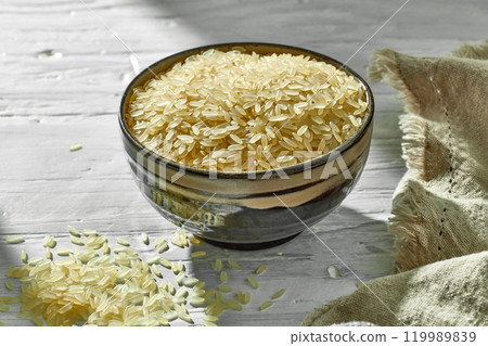 bowl of raw rice 119989839