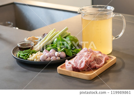 Close up to packshot of Raw Pork and herb ingredients, preparation for Cooking in Thai food menu. Close up to packshot of Raw Pork and herb ingredients, preparation for Cooking in Thai food menu. 119989861
