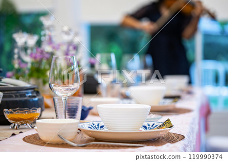 Sukiyaki Premium and Luxury Dinner Set for Celebration with special VIP guests. They have the raw material, beef, pork, chicken, egg, tofu, vegetable, shrimp, shell, squid. 119990374