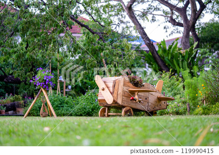 Wood plane decoration in the garden. Wood plane decoration in the garden. 119990415