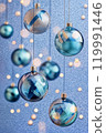 Festive Christmas and New Year composition with glittering blue shiny baubles. High quality photo with space for text 119991446