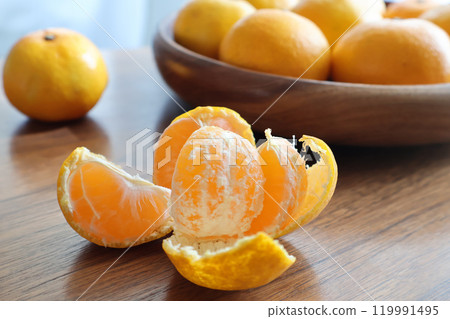 Peeled tangerines on the table Peeled tangerines on the table 119991495