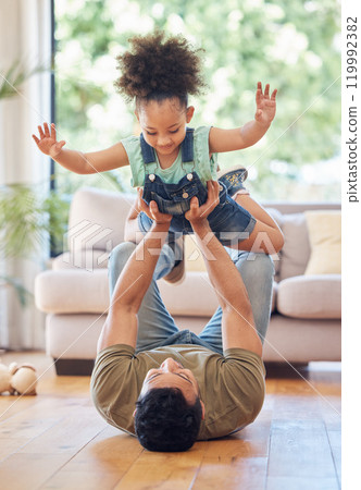 Father, child and airplane game on floor for happiness, fantasy and support in living room. Family, girl and man or dad in home for trust, development and together on weekend for security with smile 119992382
