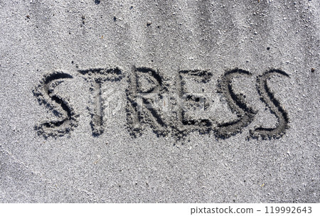 lifestyle and stress concept. Concept word Stress written on beautiful ocean sand beach. Beautiful ocean sand beach background, copy space. Medical and psychology stress concept. lifestyle and stress concept. Concept word Stress written on beautiful ocean sand beach. Beautiful ocean sand beach background, copy space. Medical and psychology stress concept. 119992643