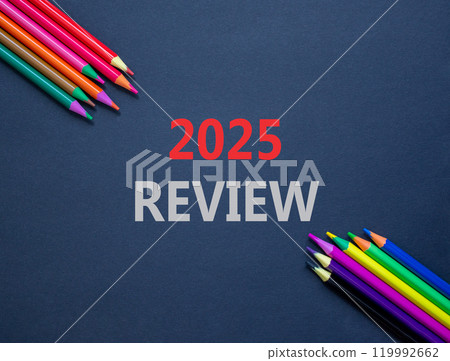 Planning 2025 review new year symbol. Concept words 2025 Review on beautiful black paper. Beautiful black paper background. Beautiful colored pencils Business 2025 review new year concept. Copy space. 119992662