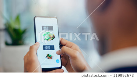 Hands, phone and man order food online with menu for dinner, meal or supper at home. Technology, restaurant and person scroll with cellphone screen on internet for gourmet dish for lunch at apartment 119992678
