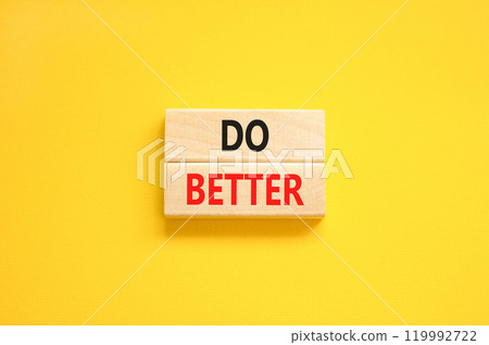 Do better symbol. Concept words Do better on beautiful wooden blocks. Beautiful yellow background. Business and do better concept. Copy space. 119992722
