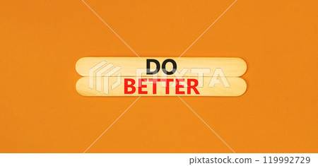 Do better symbol. Concept words Do better on beautiful wooden sticks. Beautiful orange background. Business and do better concept. Copy space. Do better symbol. Concept words Do better on beautiful wooden sticks. Beautiful orange background. Business and do better concept. Copy space. 119992729