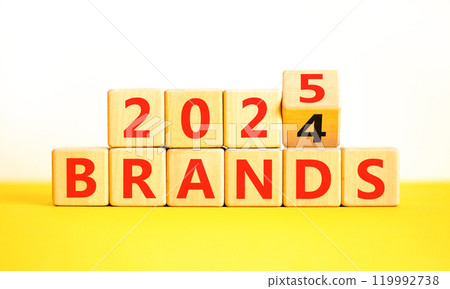Planning 2025 brands new year symbol. Concept words 2024 Brands to 2025 Brands on beautiful wooden blocks. Beautiful yellow table white background. Business 2025 brands new year concept. Copy space. 119992738
