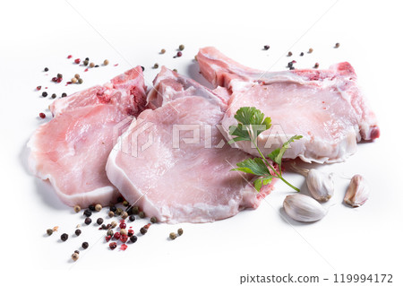 Fresh uncooked pork chops isolated on white background Fresh uncooked pork chops isolated on white background 119994172