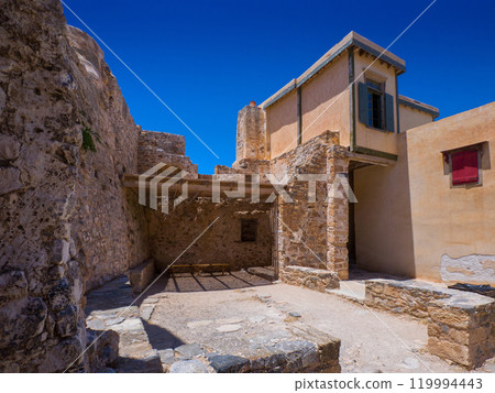 A rest area set up in a corner of the ruins (Spinalonga, Crete, Greece) 119994443