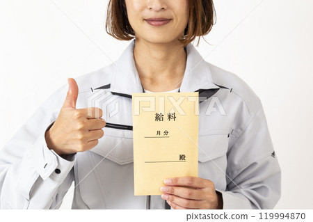 A woman in work clothes holding a pay envelope on a white background 119994870