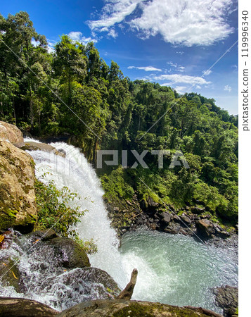 Tropical green forest and Limunsudan Falls. Mindanao, Philippines. Tropical green forest and Limunsudan Falls. Mindanao, Philippines. 119996340
