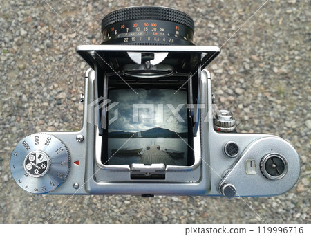 Vintage Camera Viewfinder Capturing Scenic Lake Vintage Camera Viewfinder Capturing Scenic Lake 119996716