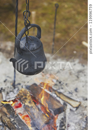 Kettle on the fire at the viking festival in Denmark 119996759