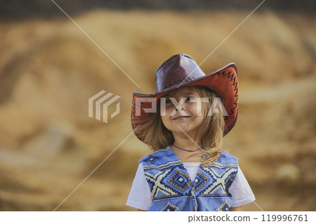 Charming child in a cowboy costume in Denmark Charming child in a cowboy costume in Denmark 119996761