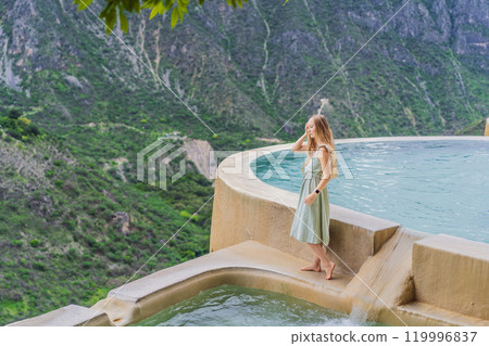 Female tourist at the hot springs of Grutas Tolantongo, Mexico. Adventure, relaxation, and natural wellness concept 119996837