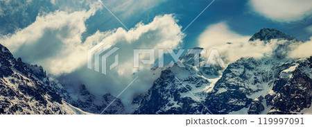 Mountain peaks near Morskie Oko or Sea Eye Lake in Poland at Winter. Tatras range Mountain peaks near Morskie Oko or Sea Eye Lake in Poland at Winter. Tatras range 119997091