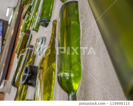 glass bottles in a wall detail glass bottles in a wall detail 119998115